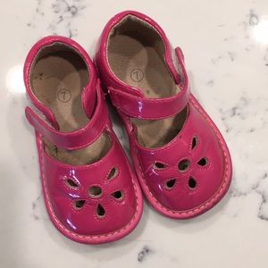 Hot pink squeaky shoes